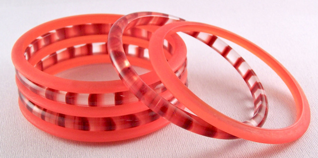 LG43 red/orange lucite spacer bangles